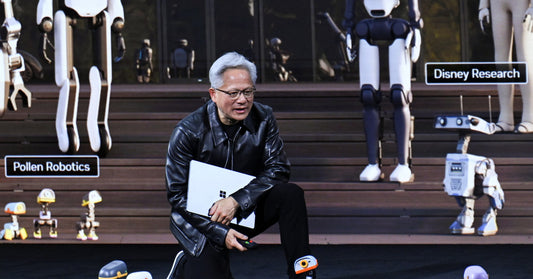 NVIDIA CEO Jensen Huang with Microduck biped robots on stage at GTC Berlin 2026. Photo Reuters Annegret Hilse