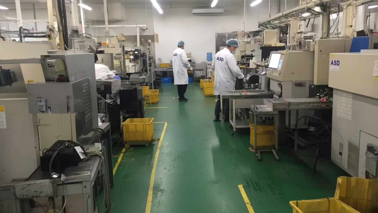 Hong Kong program review looking onto an electronics factory floor